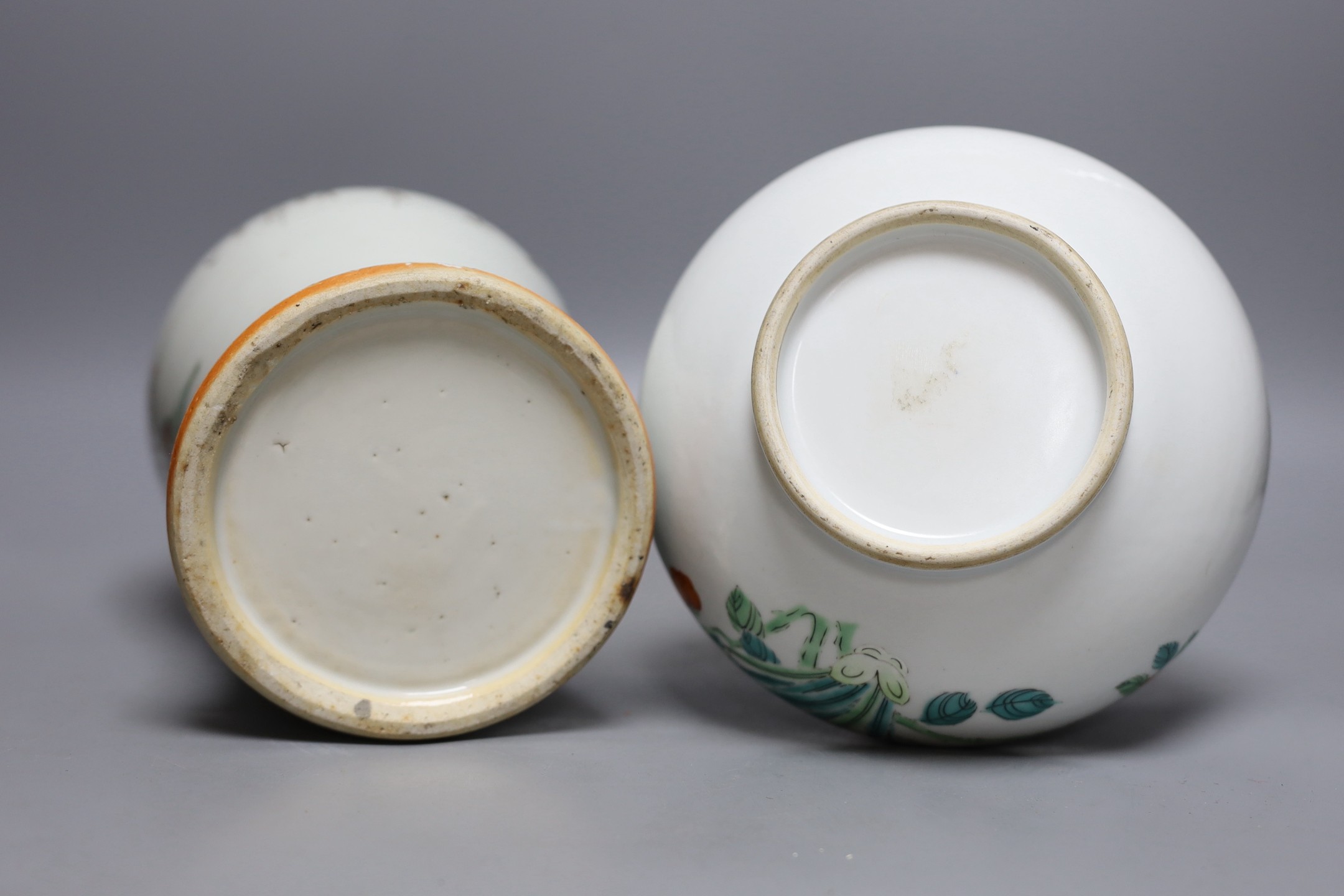 A Chinese enamelled porcelain bottle vase, 25cm high, together with a Chinese porcelain baluster jar, early 20th century, painted with figures and script